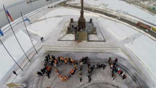 В честь Дня героев Отечества в Петропавловске состоялась патриотическая акция